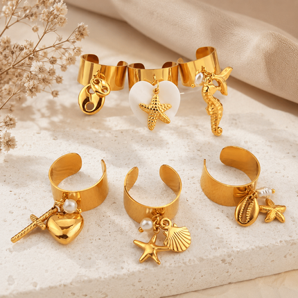 Bague Ajustable Dorée Charms Marins – Acier Inoxydable 18K | Étoile de Mer, Cœur, Hippocampe, Coquillage & Croix